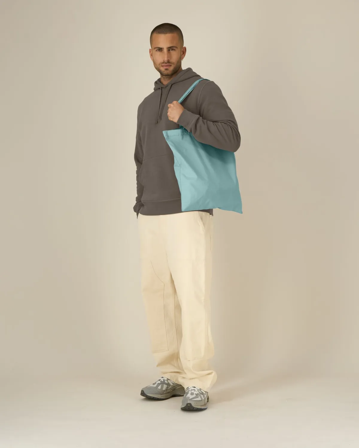 Light Tote Bag in teal monstera, voorkant